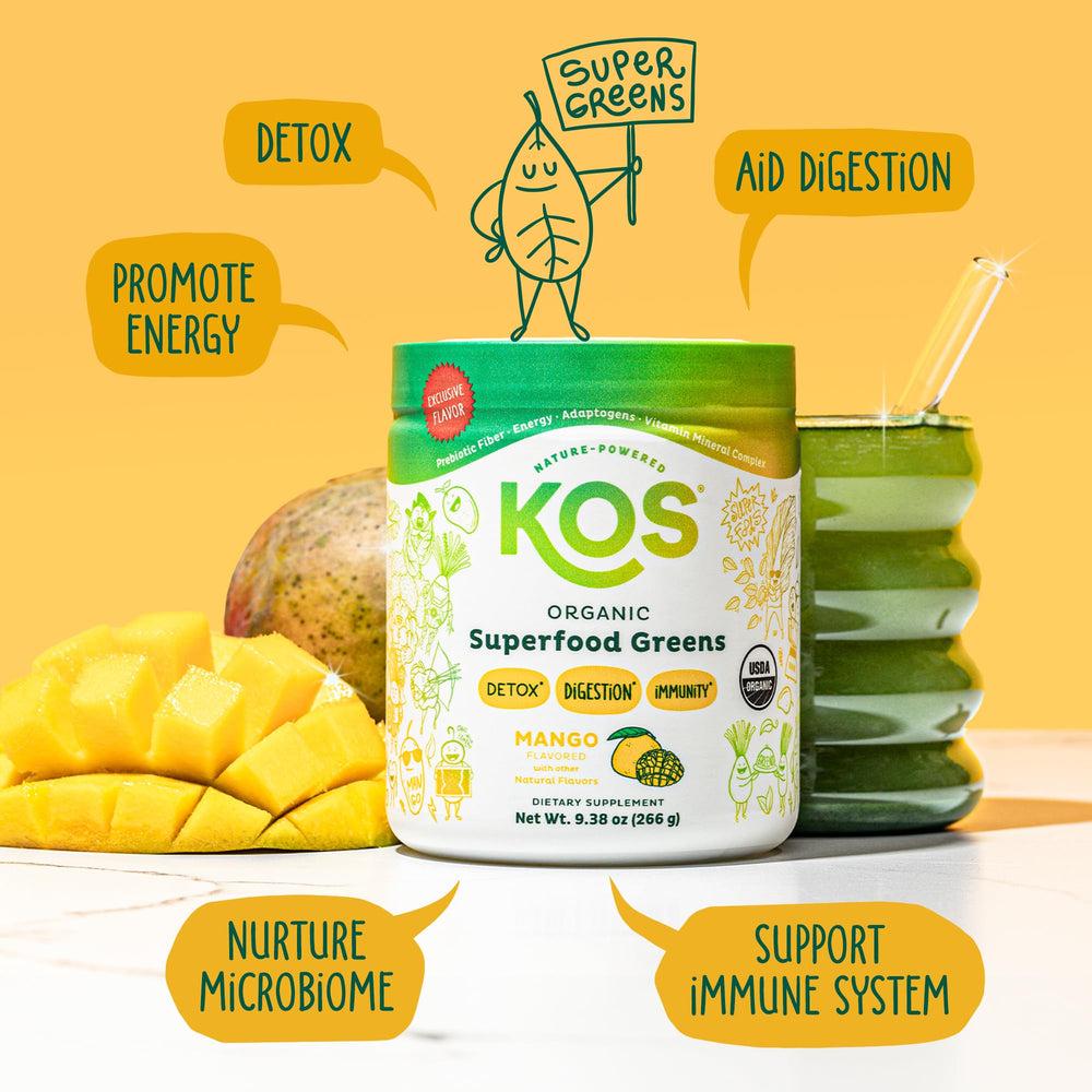 KOS Organic Greens Mango powder mixed in a glass for on-the-go refreshment.