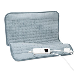 KOT large heating pad targeting back cramps with deep, soothing heat for daily relief.