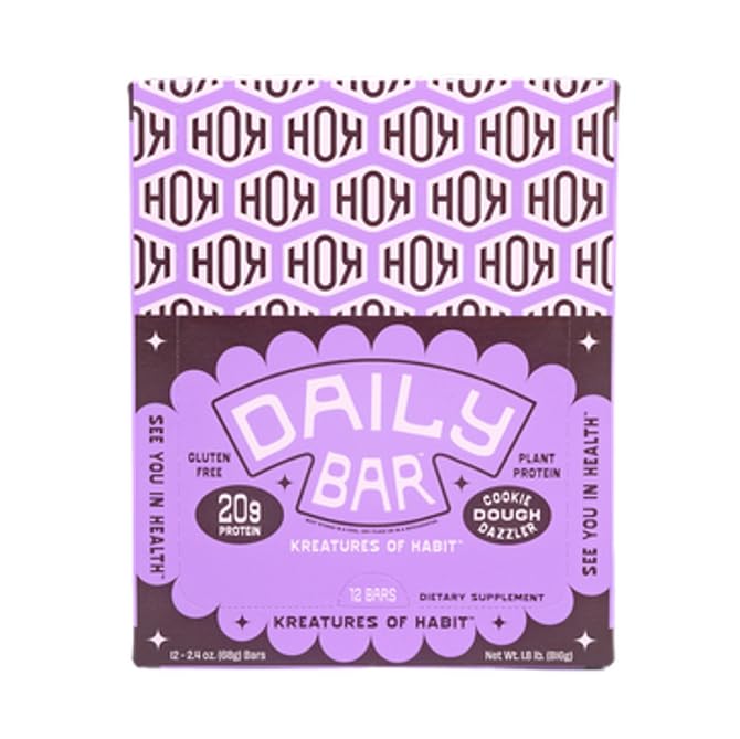 Kreatures of Habit Daily Bar cookie dough texture closeup emphasizes creamy flavor with chocolate chips.
