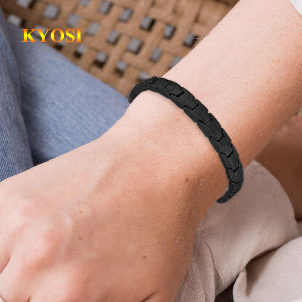 Model wearing KYOSI bracelet with a sleek evening look