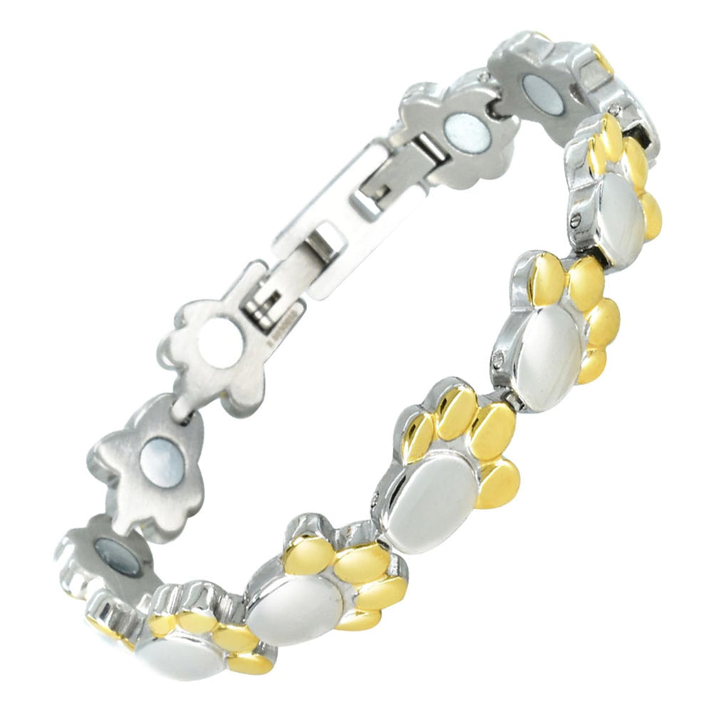 KYOSI dog paw bracelet closeup showing playful motif and polished steel shine