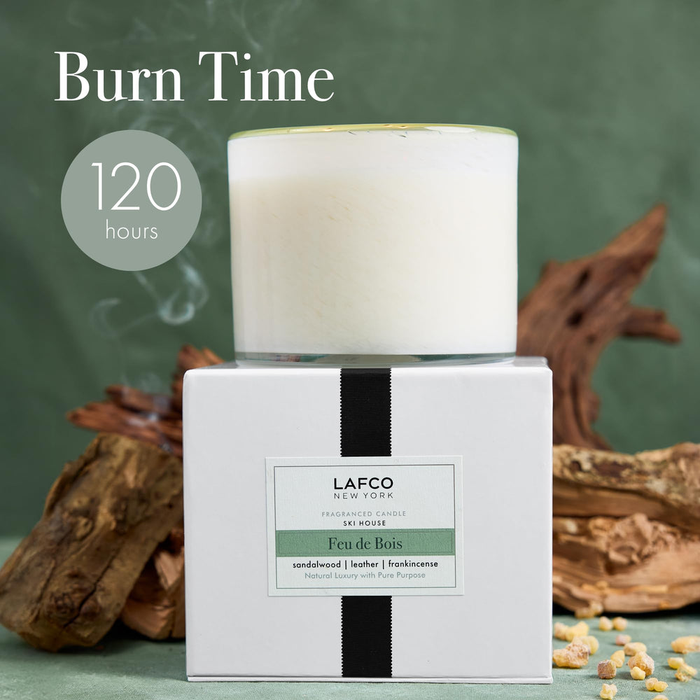 Smoky leather accords with vanilla nuances in Feu de Bois for sophisticated ambiance