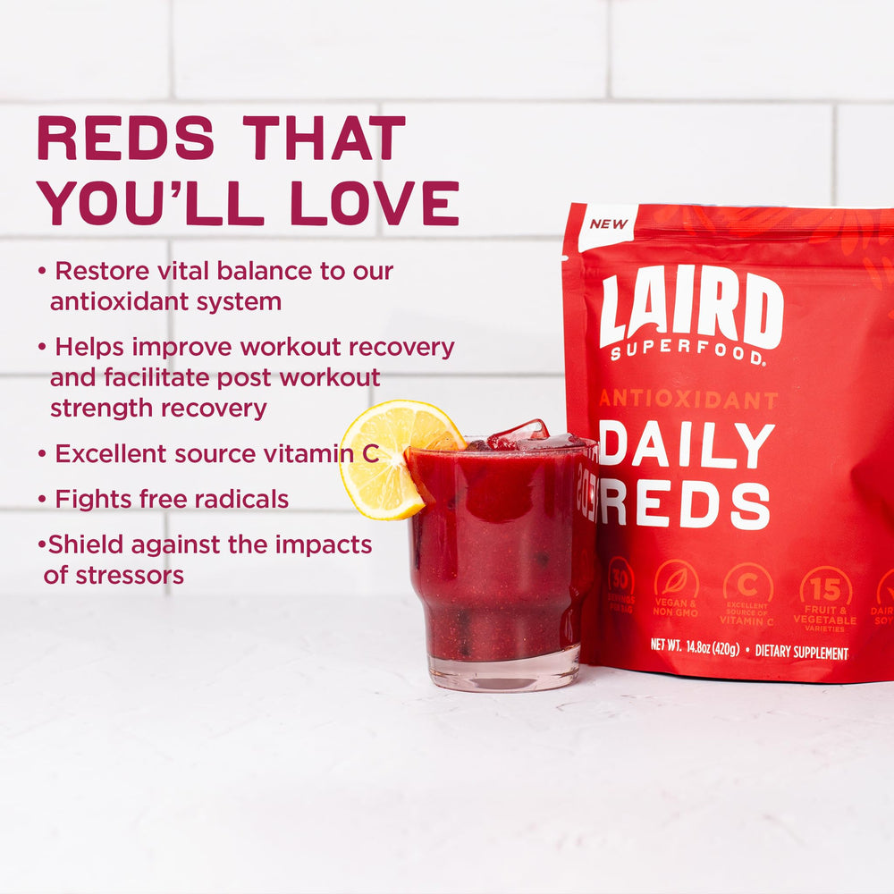 Morning setup showing Daily Reds ingredients with strawberries and blueberries