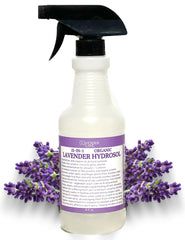 Lavender Lane bottle beside pillow for bedtime relaxation spray.
