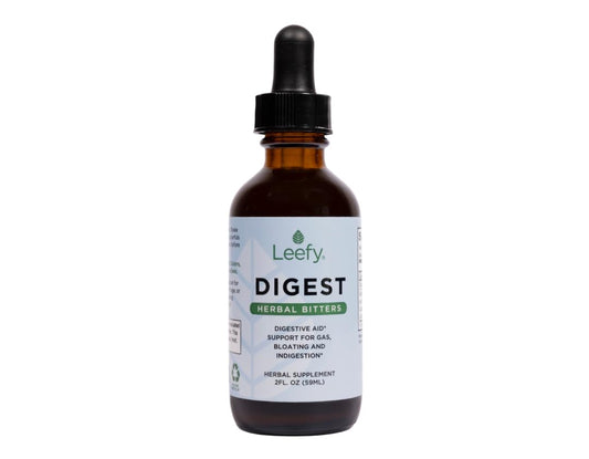 Leefy Digest 2oz bottle close-up showing herbal bitters for digestion support.