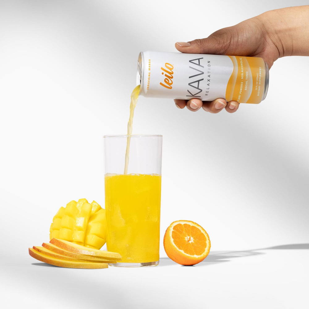 Leilo kava sparkling relaxation glass pour Tangerine Mango invites a calm moment after a long day.