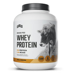 Levels Grass Fed Whey Vanilla Cinnamon tub on countertop for post-workout fueling.