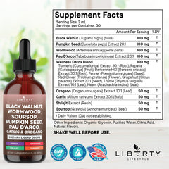 Liberty Lifestyle Defend wormwood bottle close-up showing liquid tincture for gut health.