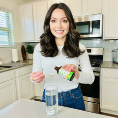 Life Tones Uric Acid Support glass with liquid ready to take