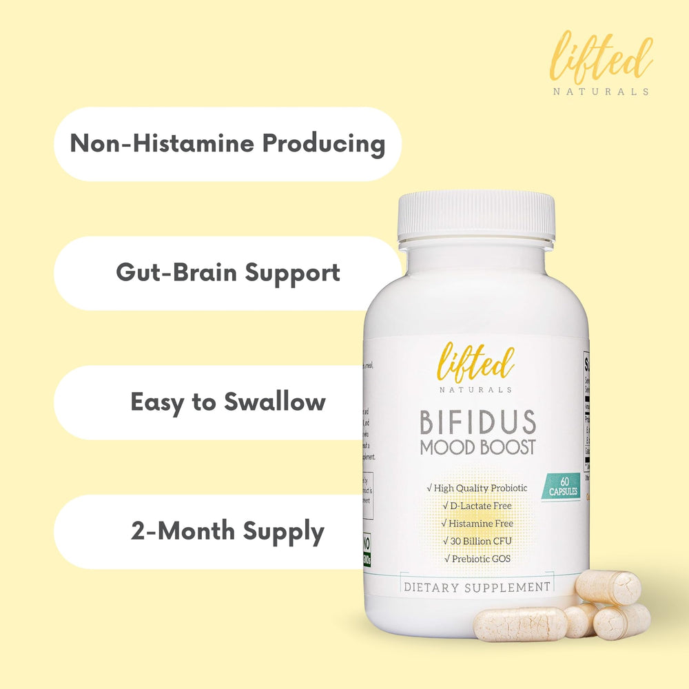 Lifted Naturals Probiotics bottle with glass of water suggests daily use.