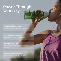 Scoop of Livingood Daily Electrolytes powder with glass for easy mixing