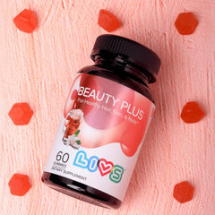 Lifestyle shot of a user taking LIVS Beauty Plus Gummies in the morning.