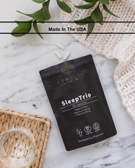LongLiv Sleep Trio capsule bottle on shelf signals third-party tested quality.
