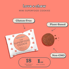A hand holds Love + Chew mini vegan cookies for a quick snack.