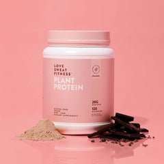 Love Sweat Fitness protein scoop in a shaker for easy plant-based recovery
