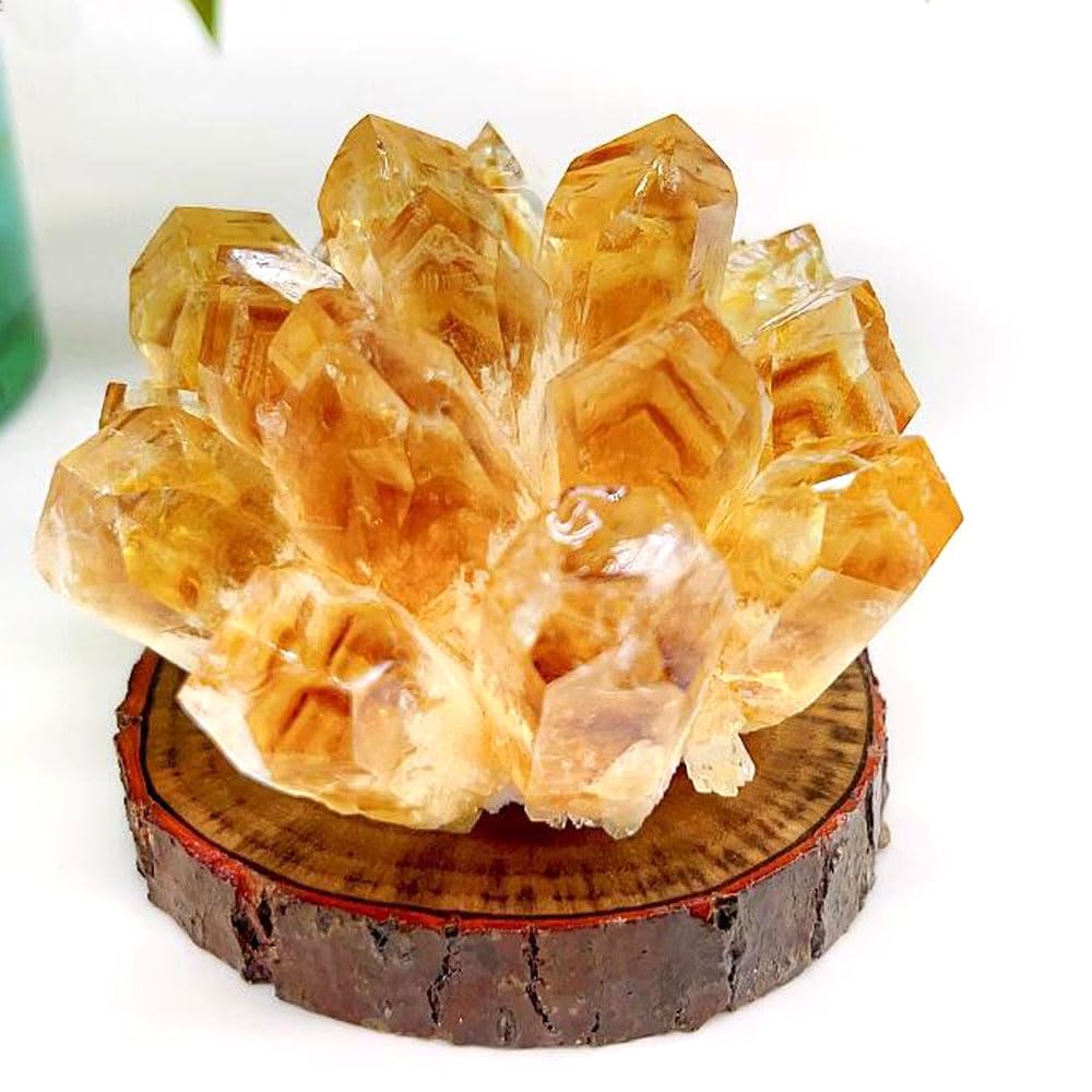 Loverain orange quartz cluster enhances home decor with a striking visual focal point.