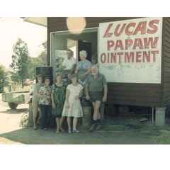 Lucas Papaw Ointment tub open, creamy texture for gentle skin nourishment.