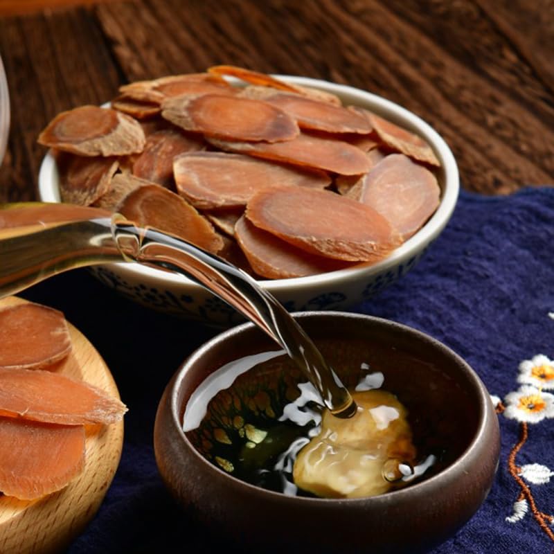 LUCENTIS red ginseng tea slices infusing hot water with a gentle aroma.