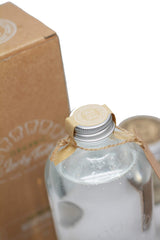 Lucky Teeth glass jar 16oz highlights sustainable packaging.