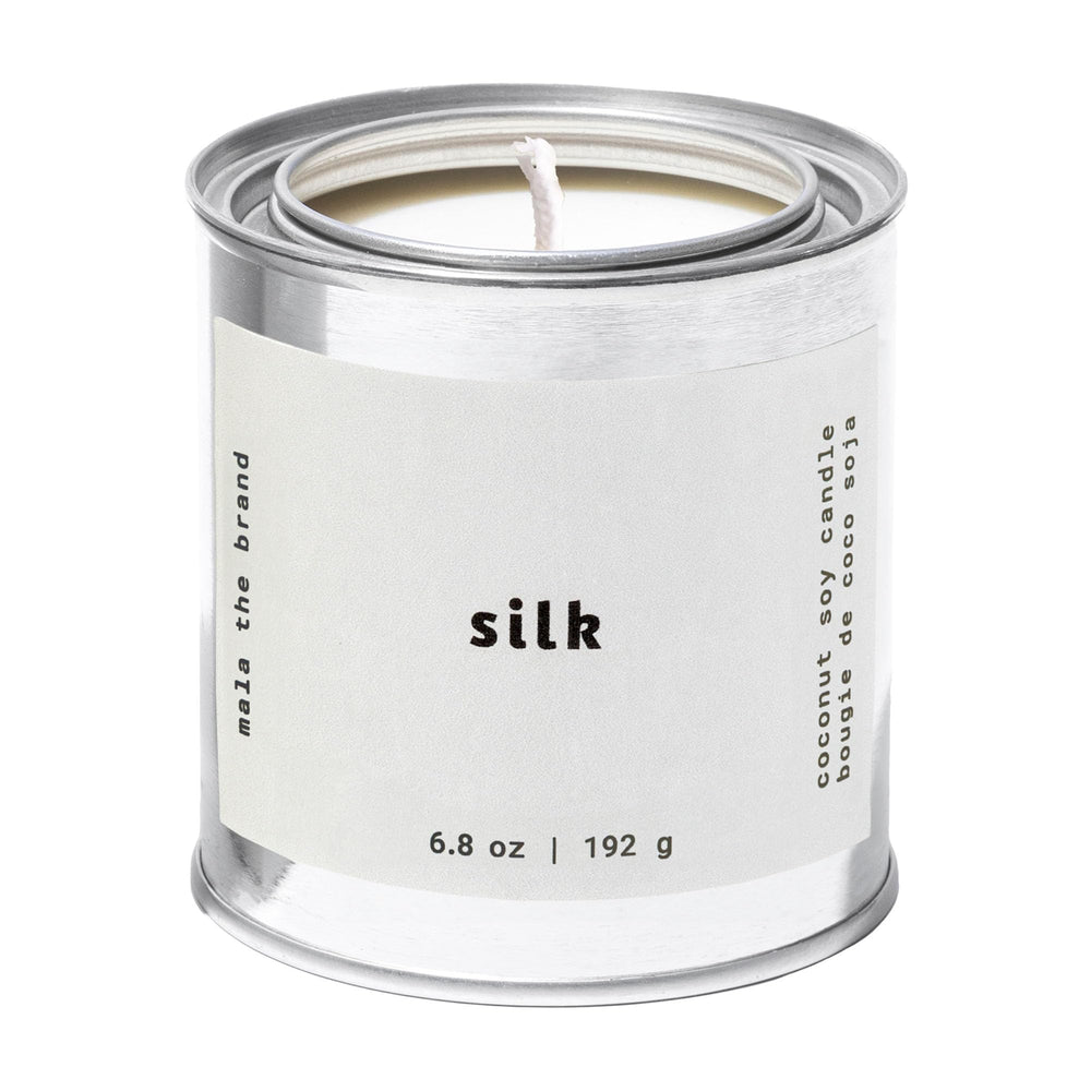 MALA candle wax pour close-up shows vegan soy blend