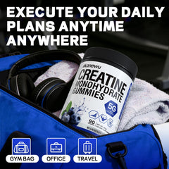 Gummies beside stopwatch and dumbbells suggesting pre- or post-workout use.