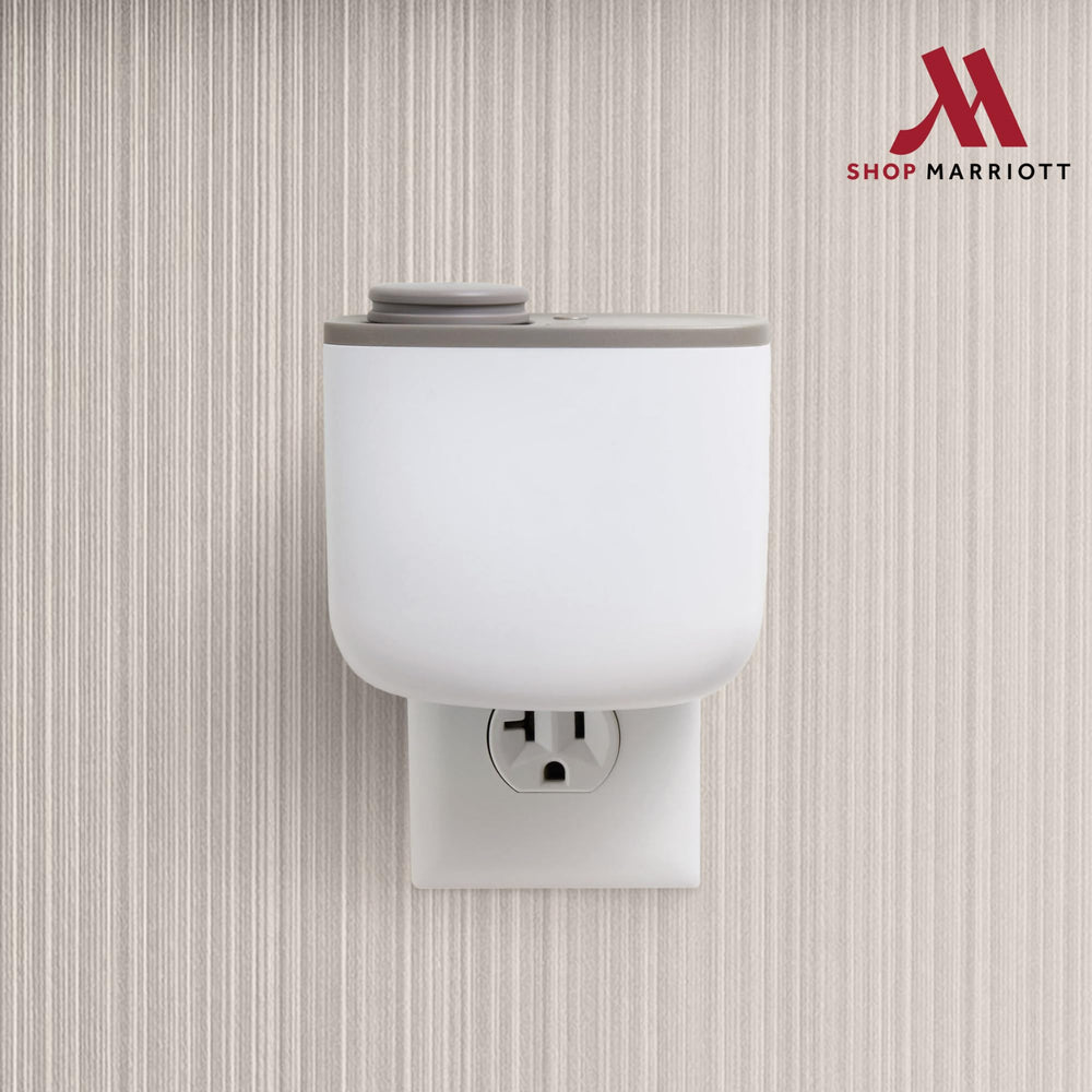 Marriott Attune notes apple and grapefruit with jasmine, rose, and cedar.