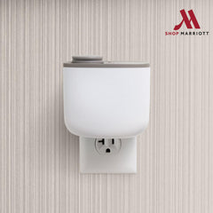 Marriott Attune notes apple and grapefruit with jasmine, rose, and cedar.