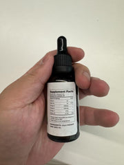 MaxHemp hemp oil label close-up shows USA-grown, non-GMO quality