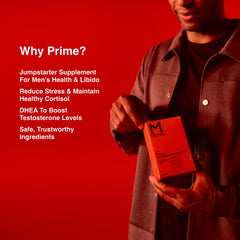 Mdrive Prime box beside bottle on a clean desk setup