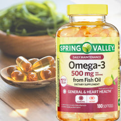 Desk setup featuring ME GUSTA Spring Valley omega-3 bottle and sticker