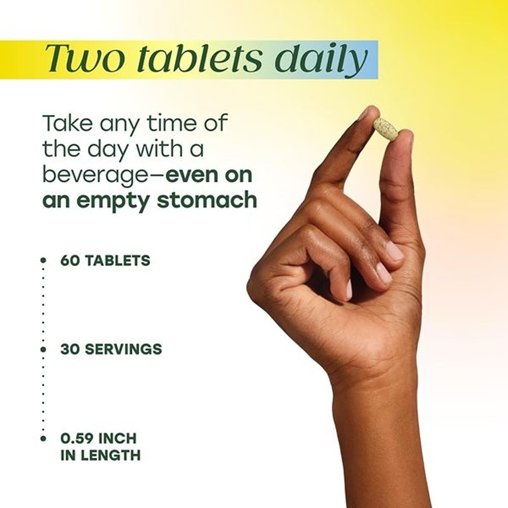 MegaFood two-tablet daily dose shown with water for easy timing.