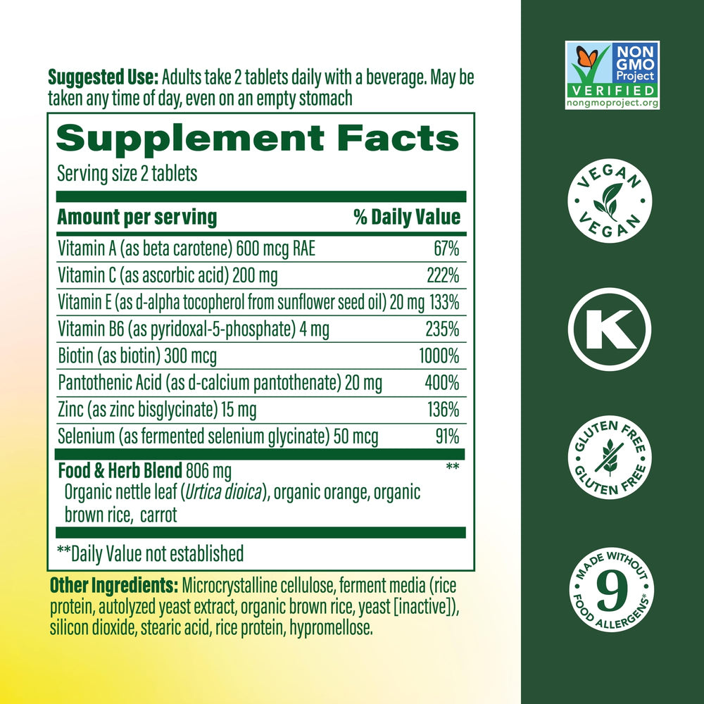 MegaFood Skin, Nails & Hair 2 tablets ready for convenient daily use.