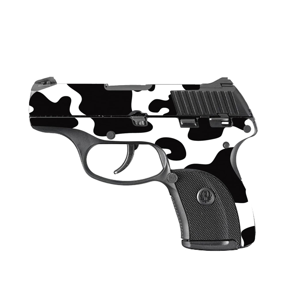 MightySkins Ruger LC9 cow print skin adds style and scratch protection.
