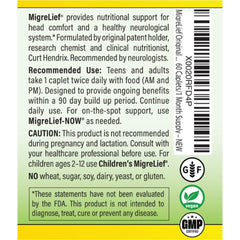 Person taking MigreLief capsule as part of routine.