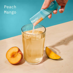 Mikra Clarity poured into water delivering calm, refreshing focus.