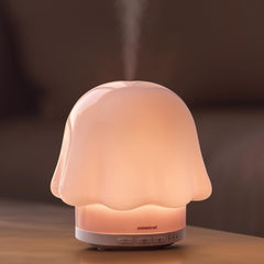 mimicat soft blush glass diffuser with calming nightly ambiance