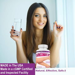 MINANATURALS Varicosolve bottle on desk, easy daily routine.