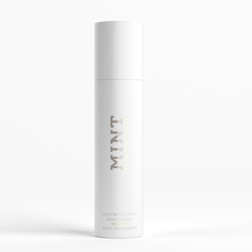 Closeup of Mint by Dr. Mintcheva Hollywood Smile bottle highlighting clean packaging