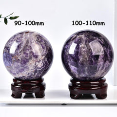 MOGEMT Side view of dream amethyst ball highlighting its size and beauty.