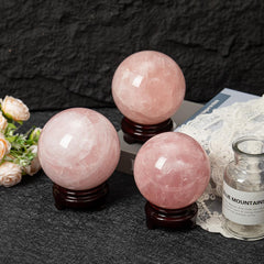 MOGEMT rose quartz sphere on base designed for stable, elegant display