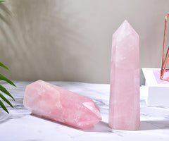 MOGEMT Rose Quartz wand on an altar grid supports meditation practice