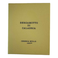 Molla 1899 Bergamotto Di Calabria candle in minimalist setting enhances spring mood.