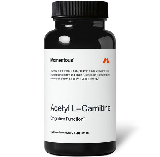 Momentous Acetyl L-Carnitine bottle closeup shows purity for cognitive support.
