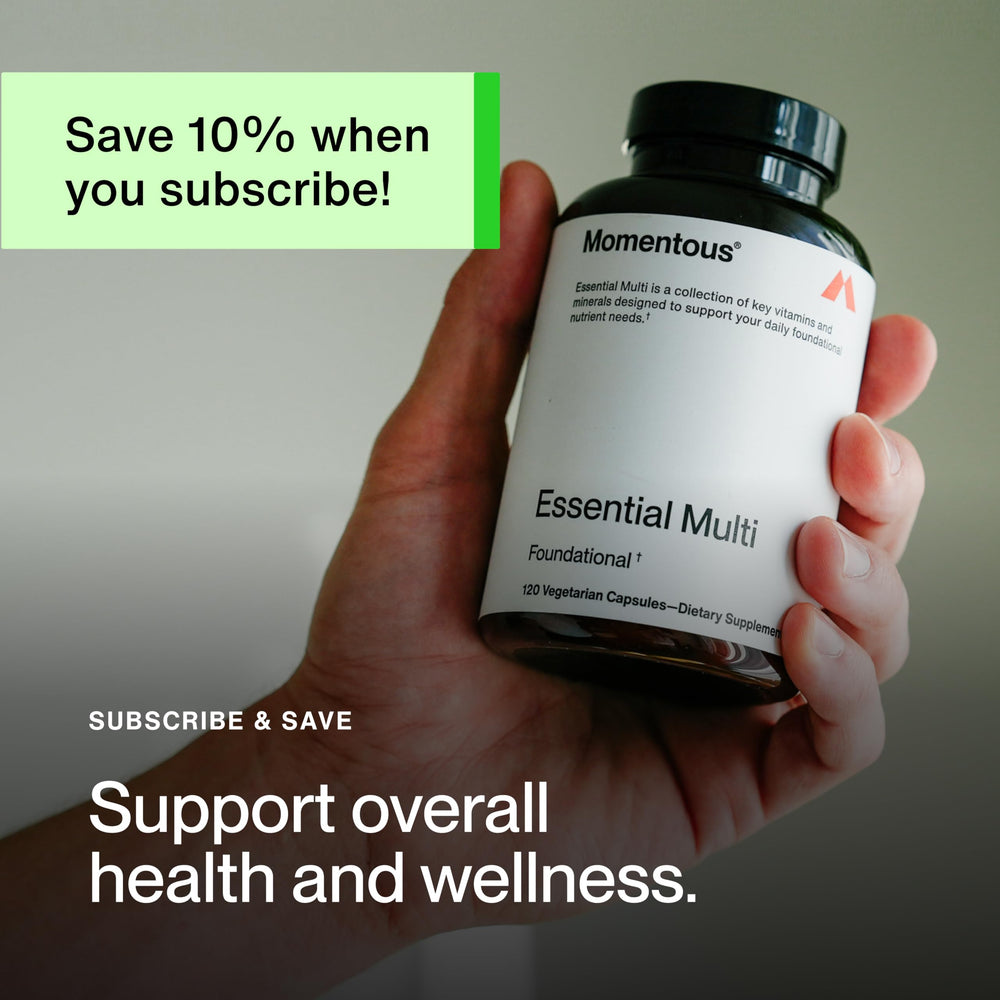 Momentous Essential Multivitamin beside gym bag for on-the-go use