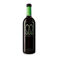 Monavie Active bottle pour shows a vibrant antioxidant blend for daily mobility support