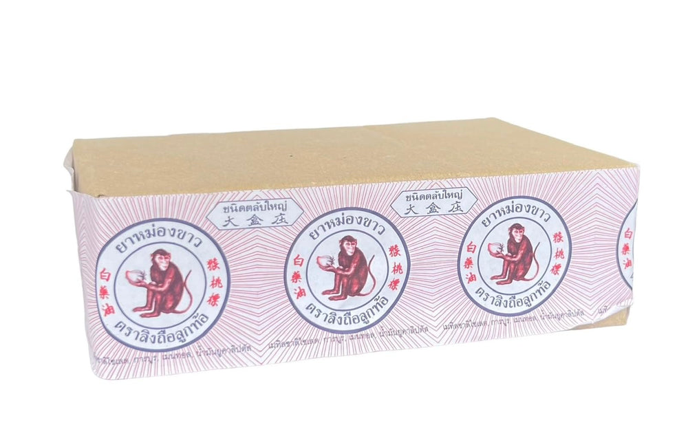 12-pack packaging of MONKEY HOLDING PEACH Balm packaging displayed for travel and everyday use.