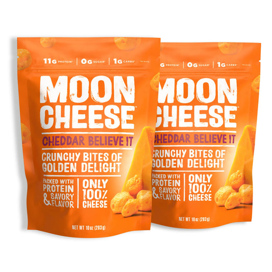 Moon Cheese Cheddar Believe It 2-pack front view, protein-packed snack for busy days.