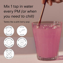 Moon Juice Magnesi-Om scoop and glass ready to mix