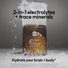 Moon Juice Mini Dew measuring spoon scooping powder for daily hydration.