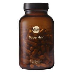 Moon Juice SuperHair bottle front shows daily vitamins for healthier, stronger hair.